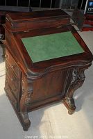 Front right three-quarter view of desk with lift-top closed