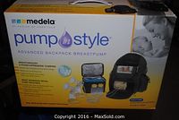 Front of retail box showing Medela logo, product name and backpack pump illustration