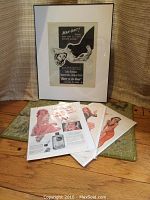 Framed Joan Fontaine signed "Man-Bait!" vintage film advertisement with three vintage Mennen shaving ads in front