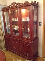 Full front view of hutch showing glass and wood sections