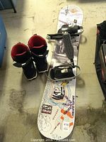 Photo showing Firefly Desert snowboard with Lamar MX25 bindings and Evolution boots size 10