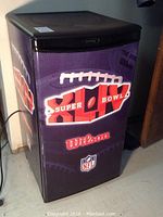 Front and side view of Danby bar fridge with NFL Super Bowl XLIV themed wrap, highlighting logos and size