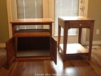 Photo of two wooden tables. Electronics table with pull-out shelf and cabinet doors on the left, side table with drawer and bottom shelf on the right. Both have wooden finish and square legs.