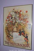 Large framed poster of The Nutcracker ballet by The National Ballet of Canada, featuring colorful characters like soldiers, dancers, and winter holiday imagery with balloons and snowmen, measuring 33x24 inches.