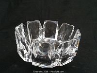 Front view of the Orrefors clear crystal bowl showing geometric vertical facets around the side.