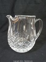Front view of the Waterford crystal pitcher showing diamond cut pattern and clear glass body.