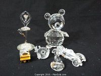 Overview of all six crystal figurines on black background