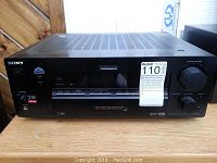 Front view of Sony Digital Audio Video Control Center showing the brand, multi-channel decoding label, control buttons, knobs for master volume and function, and power button.