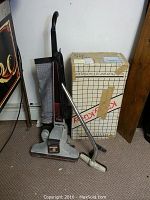 Kirby Heritage II Turbo upright vacuum cleaner with bag, wand attachment, and original box.