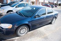 Front passenger-side view of blue 2005 Chrysler Sebring