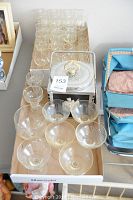 Shows the entire group of glassware including wine glasses with letter G monogram, the vintage ice bucket, and liqueur glasses.