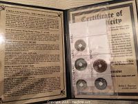 Certificate of authenticity explaining the history and dynasties of the five ancient Chinese bronze cash coins.