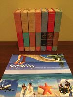 Seven children's hardcover books from 1952 second edition showing varied colored spines and gold foil illustrations on spines.