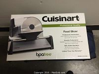 Box of Cuisinart Professional Quality Food Slicer showing front with product image and key features.