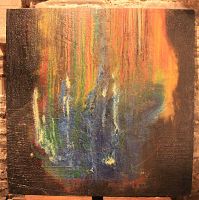 Front view of square abstract oil painting with multicolor drips against black background. Signed bottom right.