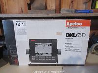 Box of Apelco DXL6510 Loran Plotter with model and company branding.