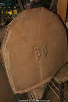 Bottom side of the large antique mirror frame showing detached wood back and frame edges