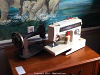 Both machines side by side showing difference in style and materials.