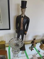 Overview showing vase and statuette side by side