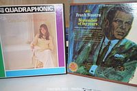 Photo showing Carly Simon Hotcakes and Frank Sinatra September of My Years album covers