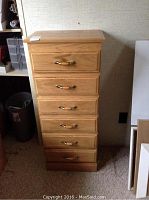 Front view of cabinet with all drawers closed