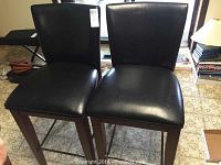Front view of two bar chairs side by side