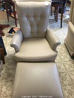 Front view of chair and ottoman together