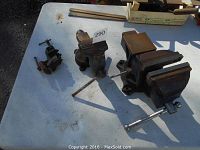 All three vises on a table: small Stanley hobby vise, medium RAE vise, large swivel base vise.