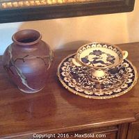 Overall photo showing the Japanese ceramic vase and the Greek blue-white 24k gold dish and platter side by side on wooden surface.