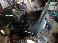Right-side view showing seat, deck and rear tire