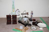 Overall view of lot arranged on carpet