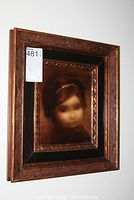 Frontal view of framed portrait