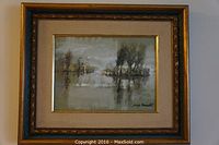 Frontal view of the framed painting showing the rainy day lake scene with trees and reflections.
