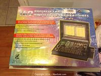 Box top showing front of the 140 Projects Lab electronic kit with project examples and display image