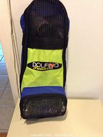 Dolfino Premier dive gear carrying bag in blue and lime green with mesh panels and zippered pocket.