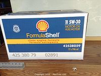 Box showing Shell FormulaShell 5W-30 motor oil branding and quantity label of 12 x 946ml bottles.