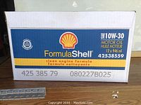 Box of Shell FormulaShell 10W-30 motor oil 12 bottles, capacity 946ml each.