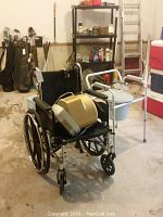 Full view of the wheelchair with potty seat on it and ladder in the background