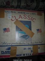 Original box of the vintage traditional American lawn chair showing brand 'Flanders Industries' and made in USA label