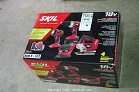 View of original sealed box for Skil 4 tool combo pack showing brand, voltage, and included tools.