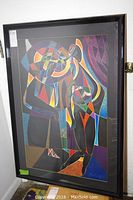 Full view of framed ‘Mardi Gras’ lithograph by Neal Doty
