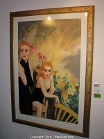 Full view of the framed serigraph print hung on wall, showing composition and frame