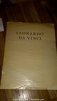 Cover of the vintage Leonardo da Vinci booklet showing the title on a cream-colored softcover with minor edge wear and aging.