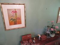 Wall mounted Asian style silk art in bamboo style frame with pink and green bamboo and leaves painted, signed Chan.