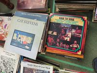 Photo showing a stack of vinyl records including Cat Stevens and a Soul to Soul compilation album.