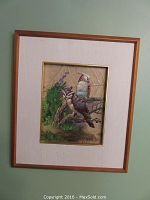 Full view of framed oil painting on leaf on board featuring birds and greenery, signed 'Gris', with wood frame and white mat.