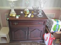 Front view of sideboard showing single drawer above double doors