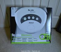 Sealed retail box of iRobot Roomba Discovery showing model name and branding