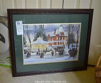 Framed and matted winter scene print with signed glass and visible label on corner.