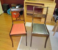 Two wooden chairs placed on floor next to a wooden desk showing size and condition.